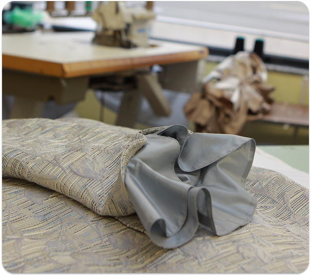 Silk cuff close up detail from manufacturing at Mode Agency Mirage.